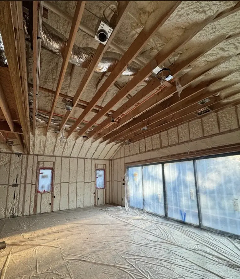 Interior walls and ceiling insulated with spray foam during new construction in Bardmoor